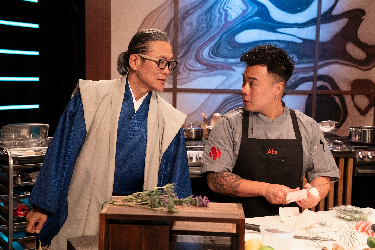 Chef Abe La with Chef Morimoto on the set of Morimoto Sushi Master